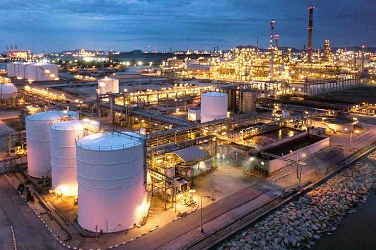 Illuminated refinery terminal and tank farm at night